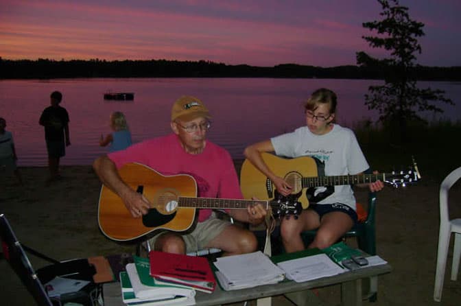 Music at sunset on Boulder Lake - Knotty Pines Resort